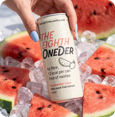 A hand holding a watermelon lime Oneder can over ice and watermelon